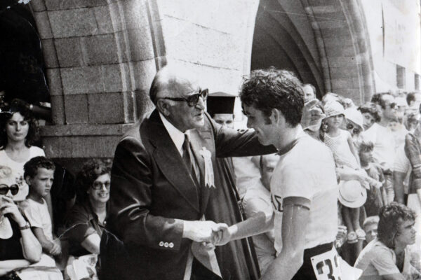 The president of the Greek Cycling Federation Tranopoulos congratulates the Balkans Championship podium finisher Stelios Vaskos.